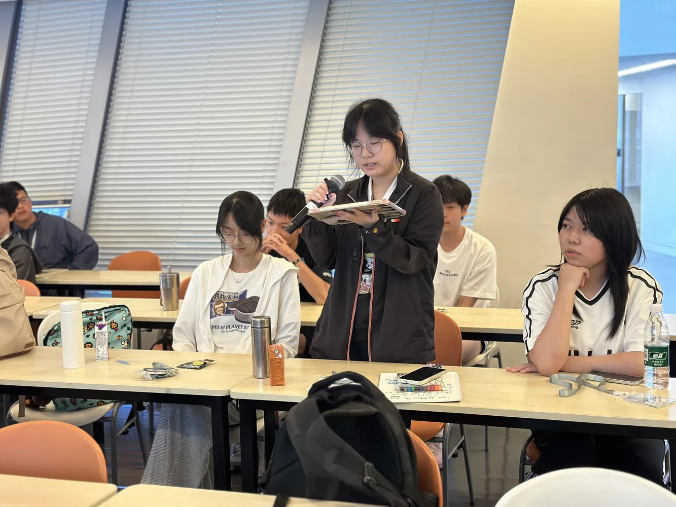 Student presenting an idea in class