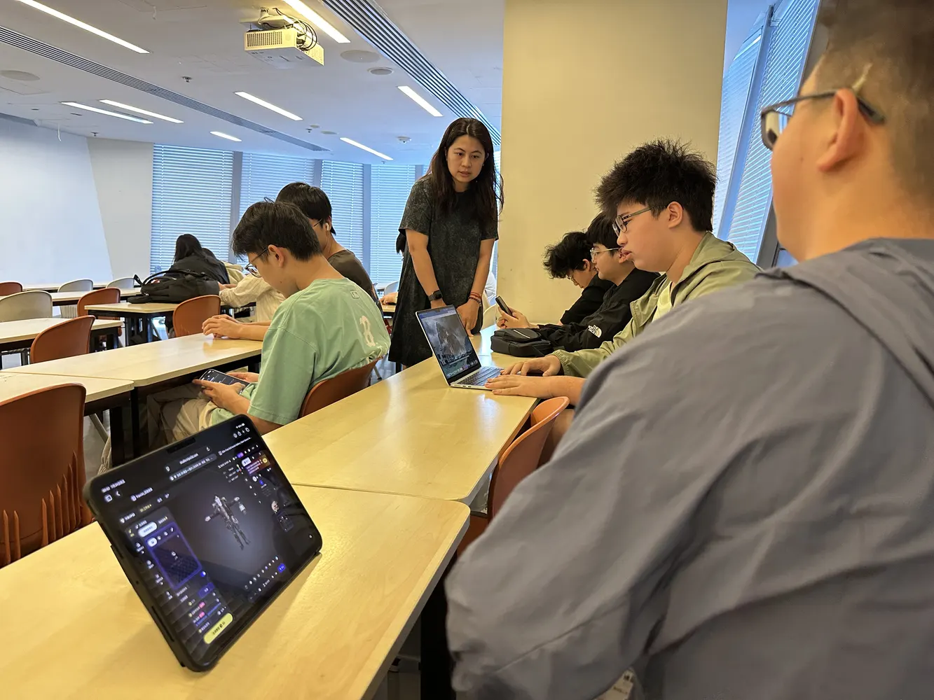 Tutor guiding digital production